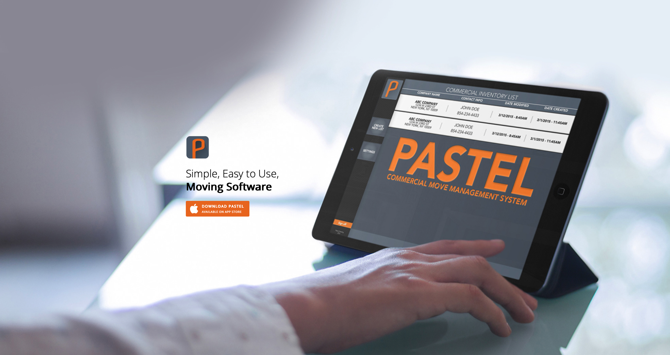 a hand touching a tablet